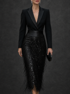 Graziana vestido midi negro con corpiño entallado, lentejuelas y flecos