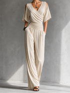 Mia | Mono elegante con escote cruzado y pernera ancha