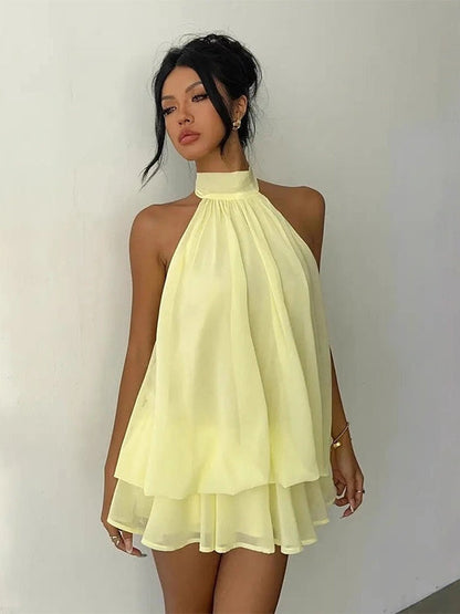 Paloma | Vestido corto fluido con capas y espalda abierta