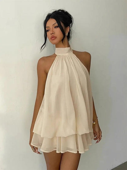 Paloma | Vestido corto fluido con capas y espalda abierta