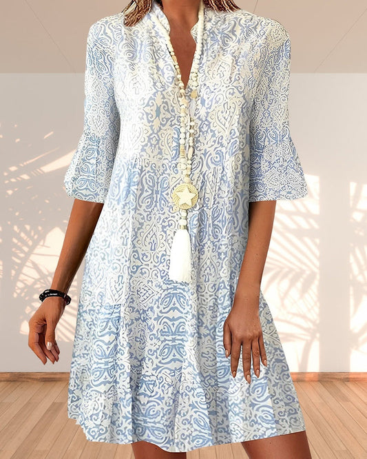 Celia | Vestido bohemio estampado con manga campana y escote en V