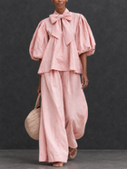 Maite | Conjunto rosa empolvado con blusa de lazo y pantalón ancho